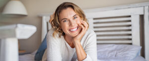 Mature woman smiling after Laser Vaginal Rejuvenation in NYC, Manhattan, Brooklyn, Greenwich, CT, Manhasset, and Ridgefield, NJ
